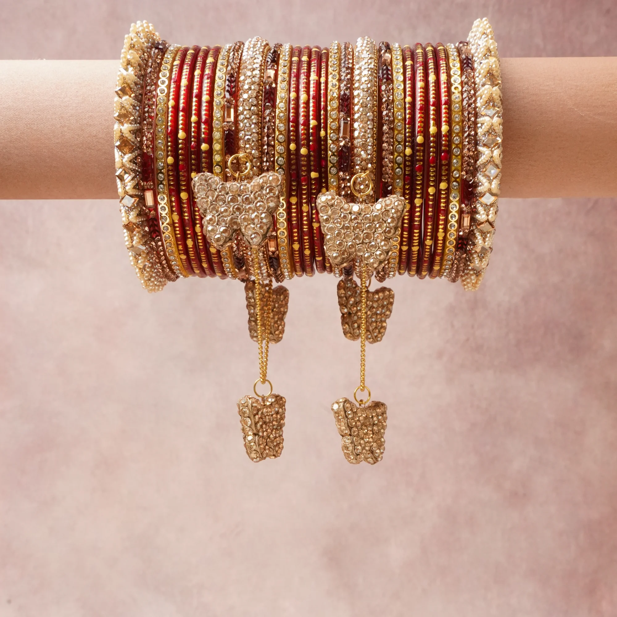 A commanding Red anchors this beautiful set, enriched with accents of Gold, Brown that add depth and dimension.

Featuring a striking composition of Glass, Gold-toned Metal, Rhinestones, Seed Beads, Faux Pearls, this set carries intricate craftsmanship and strong presence. Grand in form, it is created for moments that deserve to be marked.